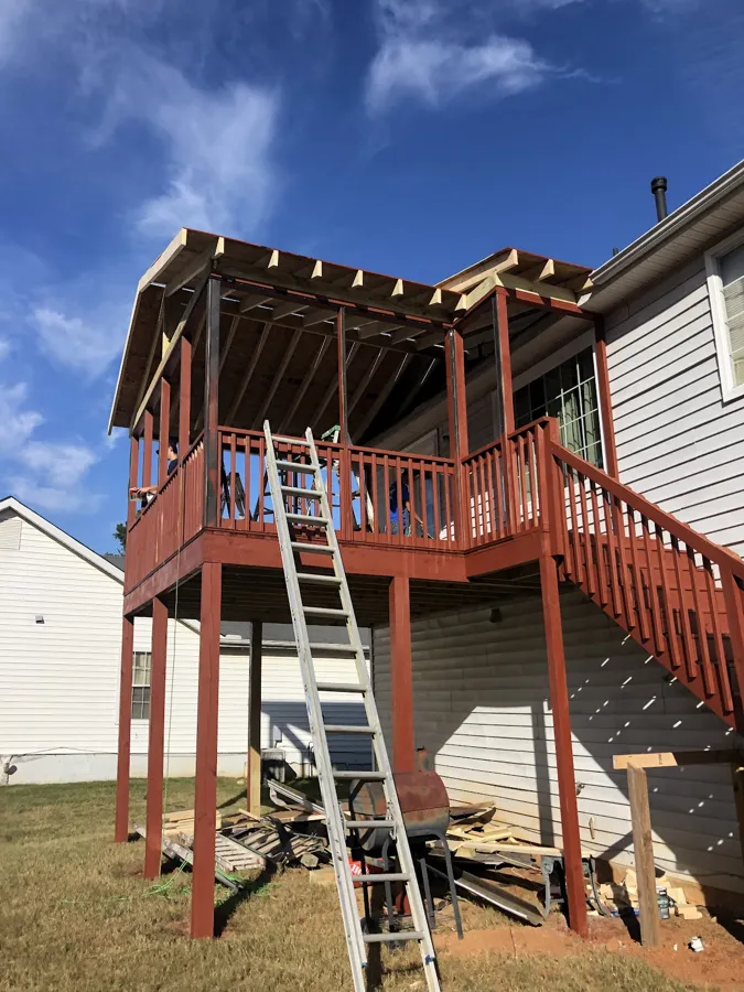 Deck framing and pergola under construction on a Griffin, GA home